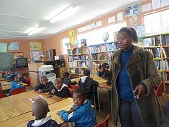 Zola Mdepha explaining to learners the instructions of the third activity